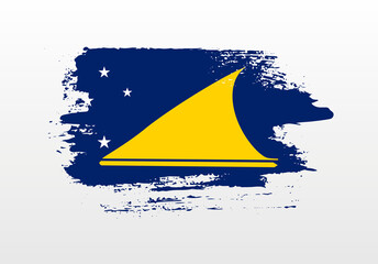 Modern style brush painted splash flag of Tokelau with solid background