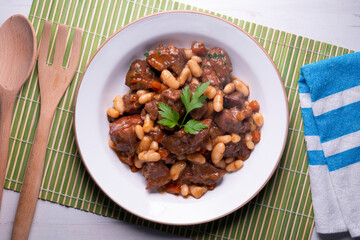 Stewed beef with broad beans and carrot. Traditional northern Spanish tapas.