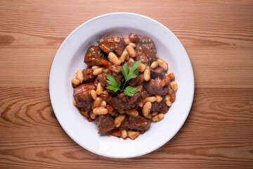 Stewed beef with broad beans and carrot. Traditional northern Spanish tapas.