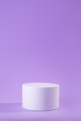 Elegant white circle single podium mockup in sunlight with shadow on soft light purple background, copy space. Template scene for advertising, presentation cosmetic product or goods, design..