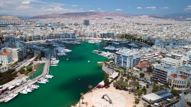 Aerial Drone View on Piraeus Greece above Harbour Port Yachts Boats Real Estates during summer sunny day