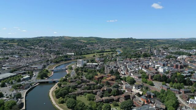 A flyover of the City of Exeter, Devon, England, UK. Traffic passing over Exe Bridges on a beautiful summers day. 