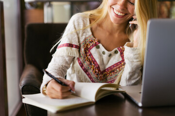 Young woman using her laptop