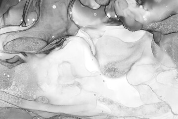 Abstract fluid art background decorated with glittering gold