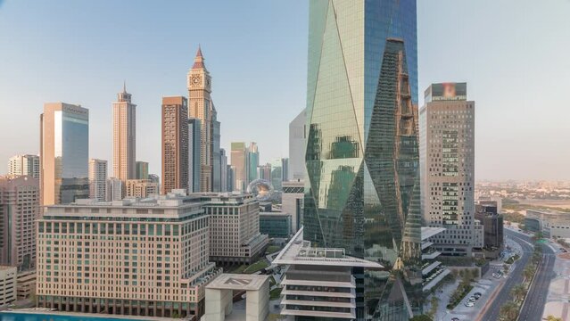 Dubai International Financial district aerial all day timelapse. Panoramic view of business and financial office towers.