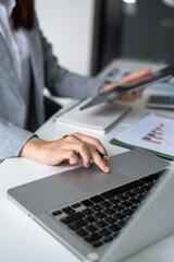 Business woman working on laptop