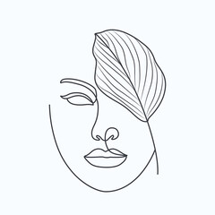 Hand-drawn woman face with leaves elegant linear drawing 