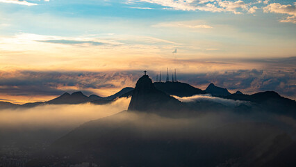 Fototapeta na wymiar Sunset in Rio de Janeiro, with Christ the Redeemer in the background