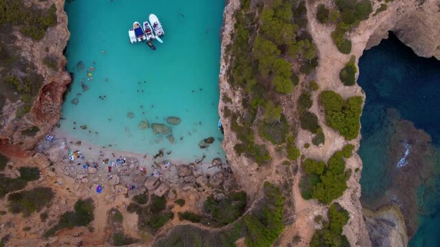 Aerial footage of the Cal&oacute; del Moro in Mallorca with is beautiful blue waters