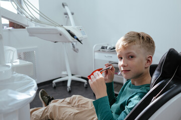 Young boy in dentistry on chair