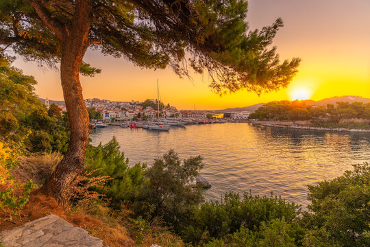 View of Belvedere Skiathos Old Port from elevated position at sunrise in Skiathos Town, Skiathos Island, Sporades Islands, Greek Islands, Greece