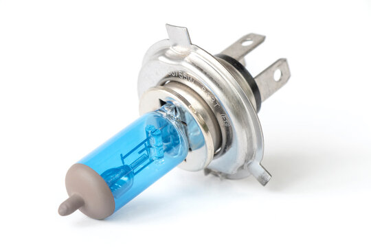 Halogen auto lamp, close-up of car headlight bulb isolated on white background