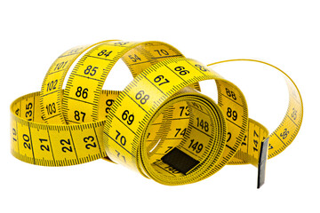 Closeup of an isolated yellow measuring tape