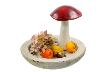 Isolated autumn deco with a mushroom in a bowl