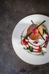 shortbread cookies with berries on a white plate top view