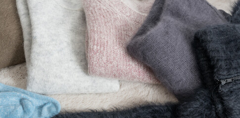 Fototapeta na wymiar Pullover aus Alpaka, Angora und Mohair Wolle für die kalte Winterzeit