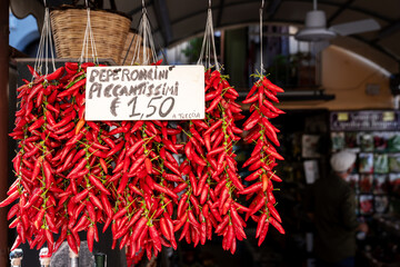 Calabrian red pepper in Tropea street market. Traditional unique ingredient in Calabria's cuisine,...