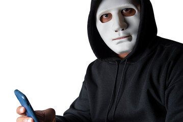 Anonymous masked hacker is using smartphones to penetrate financial data with clipping path, hacking and malware concept.