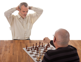 One chess player checkmates the other; isolated on white