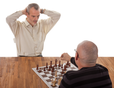 One chess player checkmates the other; isolated on white - Powered by Adobe