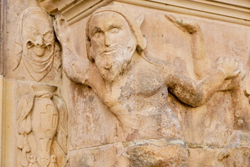 Figure and Grimace Carved in Stone