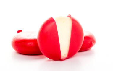 Piece of camembert cheese on white