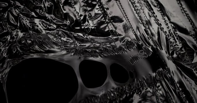 Plastic texture on a black background.