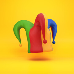Multicolored jester's hat floating on a yellow background, 3d render - obrazy, fototapety, plakaty