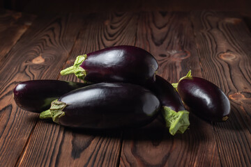 Frsh organic eggplant on the wooden boards