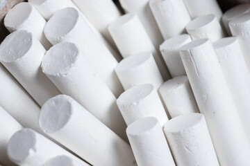 A group white chalks close up. Macro