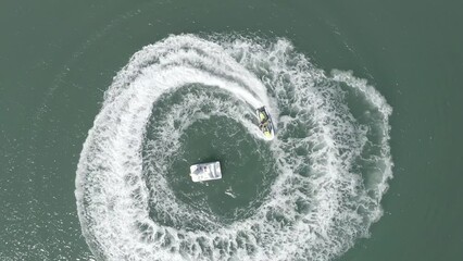 Jet ski circling in motion at the sea