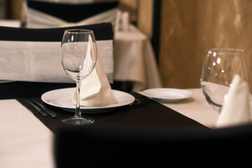 Banquet table with wineglasses. High angle of elegant banquet table served for wedding celebration