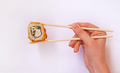 sushi with chopsticks