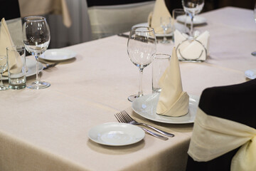 Banquet table with wineglasses. High angle of elegant banquet table served for wedding celebration