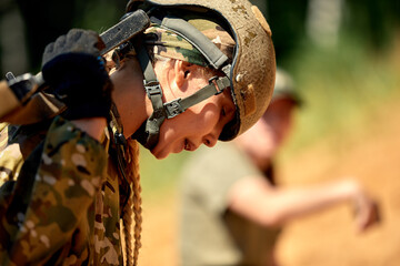 Young military soldiers during military maneuver training