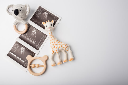 Baby toys with ultrasound picture pregnant concept