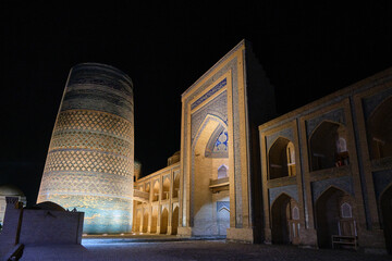 night view of kalta minor minaret and madras in khiva, uzbekistan