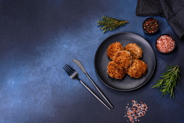 Delicious fresh ground beef patties with onions in breadcrumbs