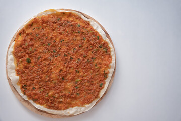 Lahmacun, the popular food of traditional Turkish cuisine. Top view of lahmacun isolated on white background.