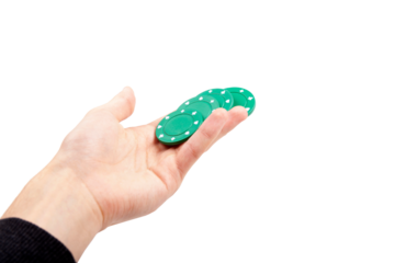 Man holding 4 green poker casino chips in hand, showing object closeup, isolated on white, cut out Game chips held in hand, giving away, gifting betting abstract concept. Gambling and winning, leisure