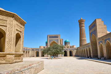 the courtyard inside the kalon mosque in bukhara, uzbekistan - obrazy, fototapety, plakaty