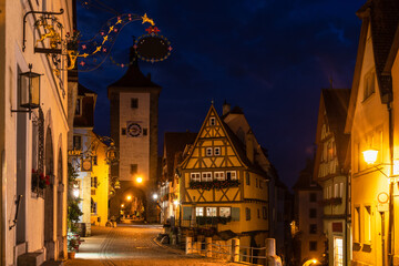 Medieval Plönlein overlooking the Siebers Tower in the evening in the german town of Rothenburg ob der tauber.