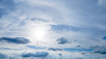 Blue sky background and white clouds soft focus
