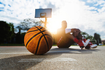 Basketball on street court - Basket ball player playing outdoor - Sport lifestyle concept