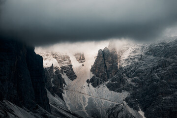 fog over the dolomites mountains