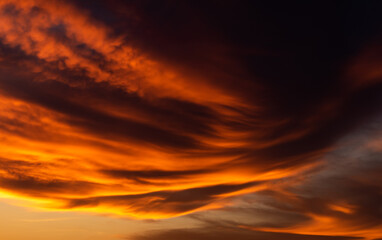 Abstract clouds with vibrant color at sunset