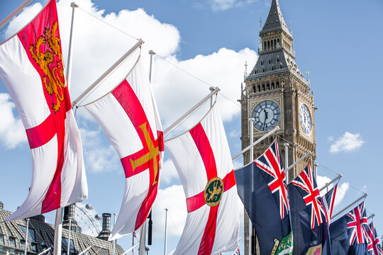 London, UK.  Big Ben, British and commonwealth countries flags during the funeral ceremony of Queen Elizabeth II