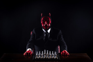 the devil plays chess, black studio background