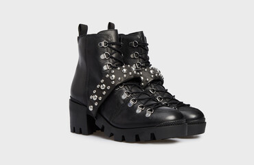 Women's fashion combat boots isolated on white background. Female classic spring autumn shoes....