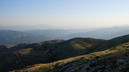 Panoramic view of Nemrut Mount and Taurus Mountains. Sunrise above Nemrut National park. UNESCO World Heritage Site. Adiyaman province, Turkey 